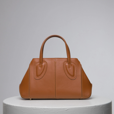 Ev stands for home, something we treasure as a family and team. Now this family has a micro version of it too! This non-structured tote was thought to be one of our strongest styles by bringing absolute function and practicality to a new distinctive level as size goes within our collections. Ev Micro's soft leather allows women to be versatile and dynamic thanks to its shapeless capability. Ev is certainly that elevated. Twist it, fold it with the magnets at the sides, it is a perfect daily bag with a short leather handle or it becomes shoulder bag with a removable cross-body strap. 
 

DETAILS

18 cm (H) x 13 cm (W) x 6,5 cm (D)
%100 Calf Leather 
%100 calf suede interior
Hand carry, shoulder carry and cross-body bag
Embossed NATURAE SACRA lettering at front 
Dust bag included 





 
PRODUCT CARE



CALF LEATHER:   Each leather hides unique characteristics such as texture and natural markings. Also, the most prominent feature of vegetal tanned leather is that it changes color with usage. Aging and tone variations should not be considered an imperfection as leather is a natural product. Please, avoid contact with water and any oil-based substances. 
Fulfilled by our friends at NATURAE SACRA 
*Please Note: 

 Rewards cannot be applied to this product
This item is not eligible for returns 
This item cannot be shipped outside the U.S.




 

 
  