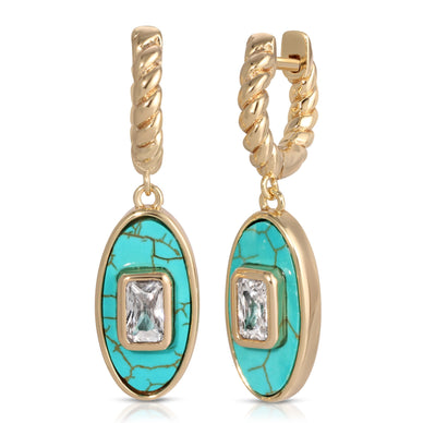 A cz baguette swimming in a sea of truly gorgeous turquoise 
14k gold plated over brass drop earrings with genuine turquoise and cz baguette accent 
Fulfilled by our friends at  Leeada 
*Please Note: 

This item is not eligible for returns 
This item cannot be shipped outside the U.S.
