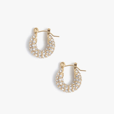 The It Hoop for girls that get it — meet Audrey. Available in both Hoop and Huggie sizes, this clickhoop pavé diamond earring is the statement you never knew you couldn't live without. Small in diameter but big in statement — Audrey is light (and small) enough to wear every single day — yet sophisticated enough to rock with formal attire. Named one part for Ms. Hepburn herself and two part for Ms. Audrey Hope, the designer's soul coach and guest on Season 1 of the Marrin Costello Radio podcast — the Audrey's are stunning just as much as they are meaningful. From brunch to prom to bridal galore and everything in between — this hoop is not a want but a need. 

Click-back closure — for pierced ears
0.5" diameter

Fulfilled by our friends at MARRIN COSTELLO 
* This product cannot be shipped outside of the U.S. 

Please Note: Rewards cannot be applied to this product 