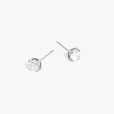  Because every body needs a staple diamond stud earring. Meet Blair — our basic diamond collection for the non-basic b's. Available in both 3mm and 4mm diameter, these simulated diamond stud earrings scream luxury without breaking the bank. Guaranteed non-tarnish, hypoallergenic, rust-resistant, and water-resistant — Blair is crafted of the most exceptional materials, and engraved with our signature logo — so you know they're real. Perfect for wearing on their own, or layering multiple sizes together for our girlies with multiple ear piercings. 

Butterfly earring backings
Post-back closure — for pierced ears
4mm simulated diamond

Fulfilled by our friends at MARRIN COSTELLO 

Please Note: Rewards cannot be applied to this product 