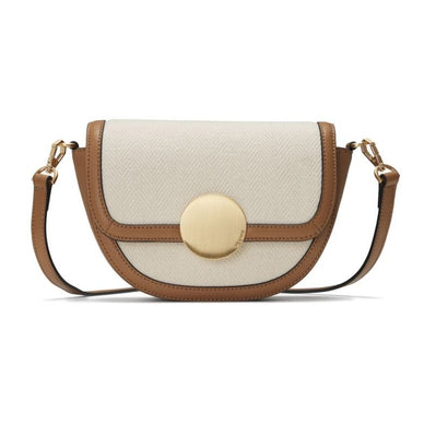 Upgrade your looks with the Lottie Canvas Crossbody. It’s available in cloud and sand brown. Complete your favorite looks with this half-circle-shaped handbag. Wear as a crossbody or remove the straps and wear as a clutch for a more polished look. From jeans, sneakers, and t-shirts to bodycon dresses and heels, Lottie pairs well with any outfit in your closet. Consider this canvas crossbody your newest go-to bag. 
Materials Measurements: 

Cow Leather/Canvas
Width 7.5"
Height 5"
Depth 3"
Strap Length 44-50"

Ships separately from our friends at FutureBrandsGroup 

Please Note: Rewards cannot be applied to this product 